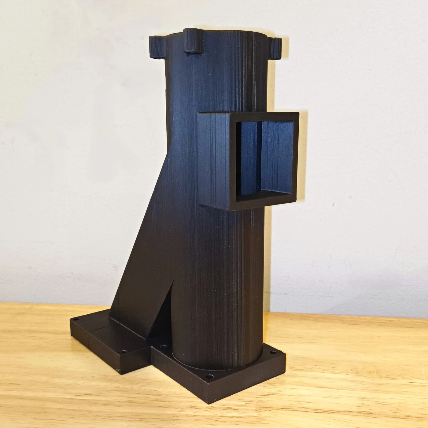 Tall black custom 3D-printed functional component